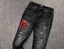 Carregar imagem no visualizador da galeria, Calça Amiri Jeans Logo Vermelho